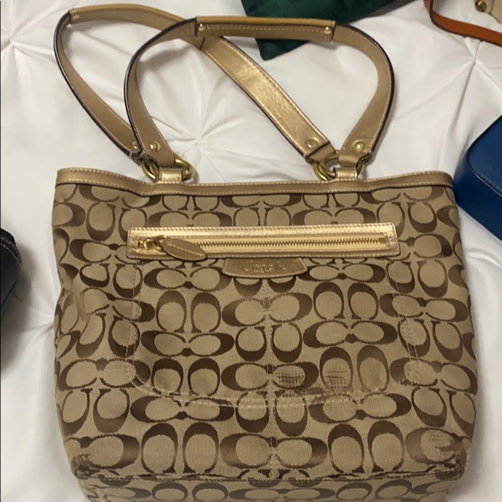 Gold coach purse